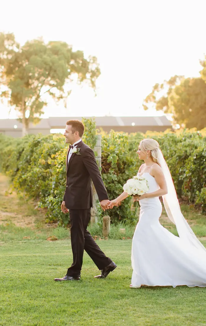 5 Paradise Swan Valley Wedding Venues Amplify Your Happiness | Take A Vow Stories A couple holding hand