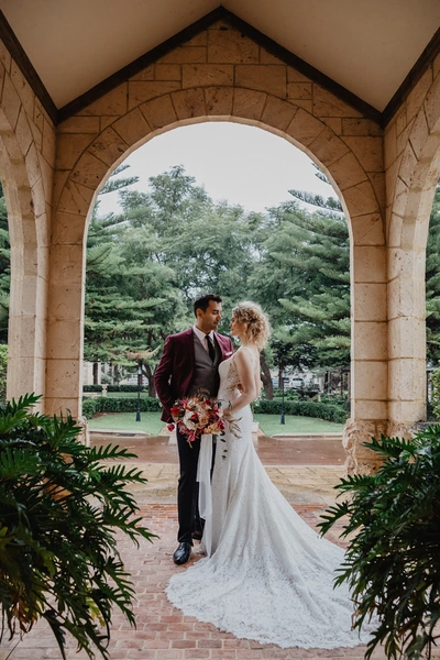 5 Paradise Swan Valley Wedding Venues Amplify Your Happiness | Take A Vow Stories Bride and Groom Stand in Portico